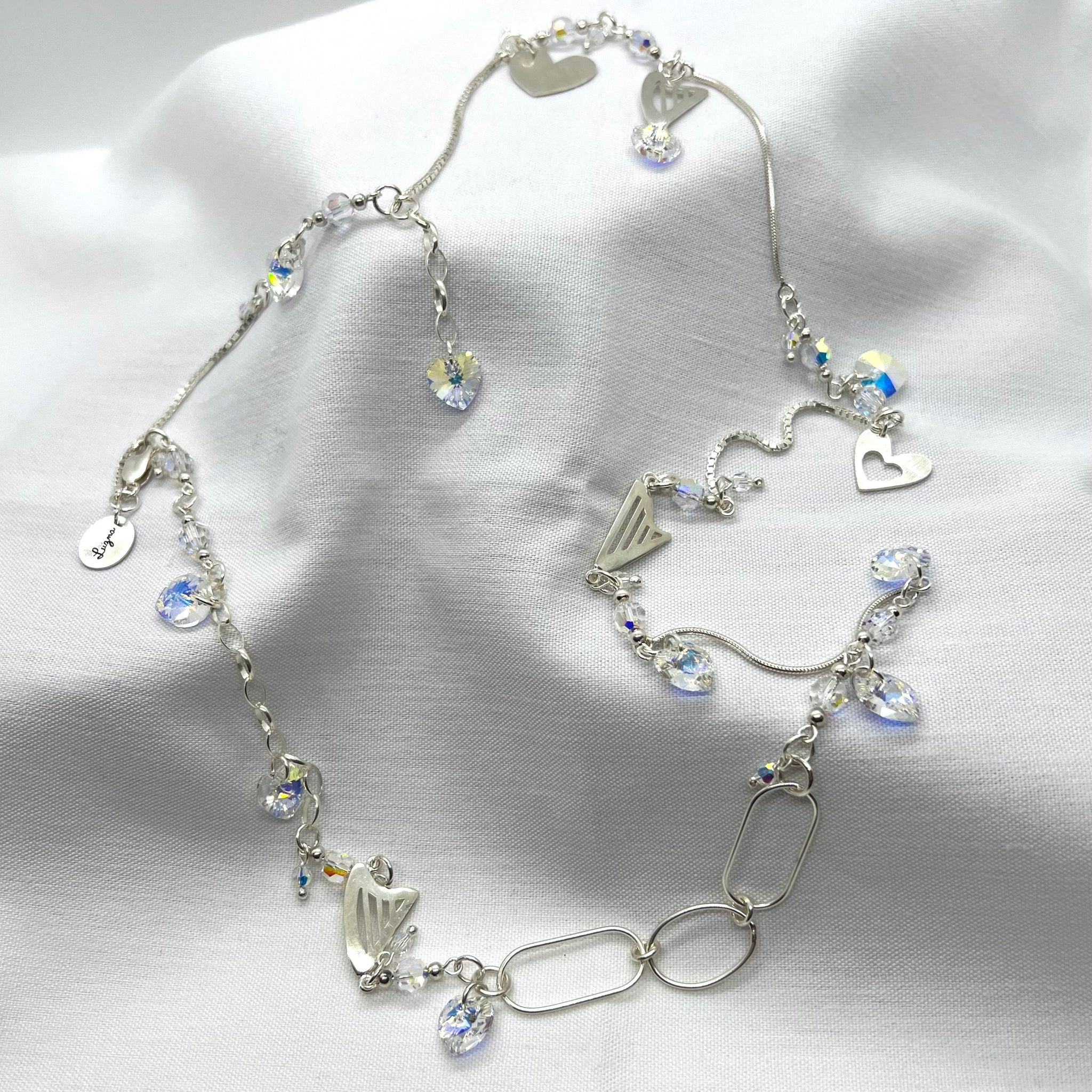 LONG NECKLACE WITH HARPS AND CLEAR SWAROVSKI HEARTS & CRYSTALS